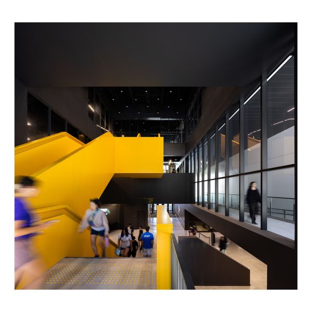 The UBC Recreation Centre is a state-of-the-art facility that reflects the university’s commitment to community health, wellness, diversity, and inclusion. At its center is a multi-height lobby that serves as the building’s primary circulation spine, linking the fitness areas, gymnasia, change rooms, and multipurpose spaces.
 
A bright yellow feature stair anchors the atrium, acting as both a sculptural focal point and an intuitive wayfinding element. The welcoming lobby showcases multi-level movement throughout the building, with layered sightlines and varied circulation paths that create a dynamic and engaging spatial experience. 
 .
.
.
.
.
.
#ArchitectureLovers 
#UniversityArchitecture #CampusDesign 
#RecreationDesign #CommunitySpaces #StairDesign 
#FeatureStairs #CanadianArchitecture 
#WestCoastArchitectureubcathletics #emapeterphotography
